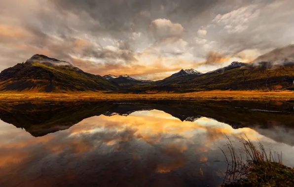 Picture forest, the sky, clouds, sunset, mountains, reflection, rocks, the evening, pond, symmetry, mirror