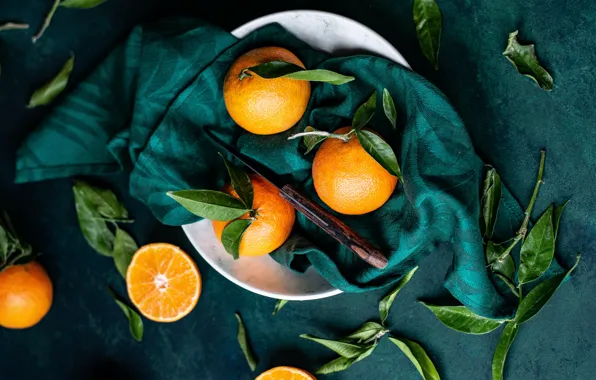 Picture leaves, the dark background, oranges, plate, knife, fabric, fruit, tangerines