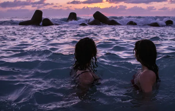 Picture wave, girls, in the water, Rocked by the waves