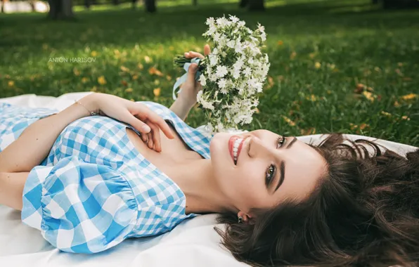 Picture girl, flowers, face, pose, smile, mood, hair, lawn, a bunch, Anton Kharisov, Maria Bashmakov