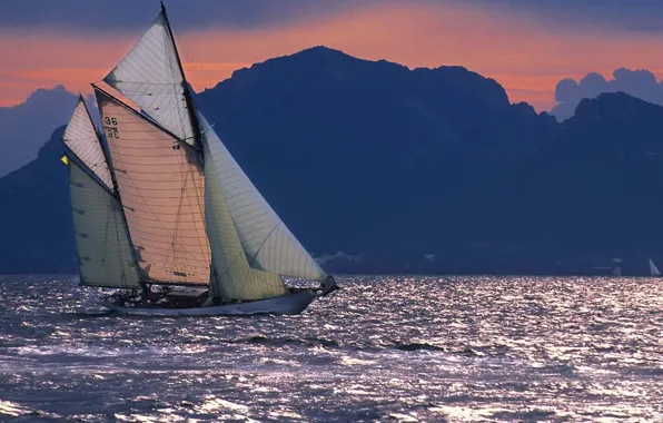 Picture sea, sunset, mountains, the way, the wind, coast, ship, sailboat, the evening, sails, vehicle, sailing …