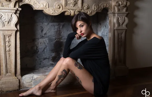 Picture look, pose, model, portrait, makeup, figure, brunette, tattoo, hairstyle, fireplace, blouse, legs, sitting, on the …