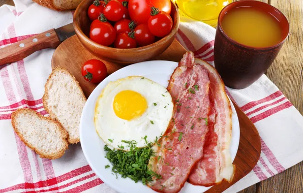 Picture glass, table, juice, plate, bread, knife, Board, scrambled eggs, tomatoes, tablecloth, bacon, eggs