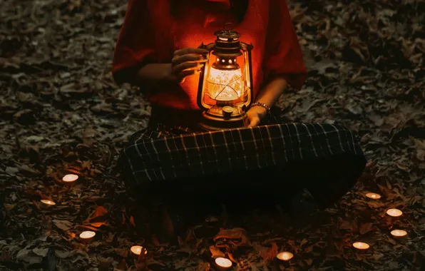 Picture autumn, leaves, girl, light, candles, lantern