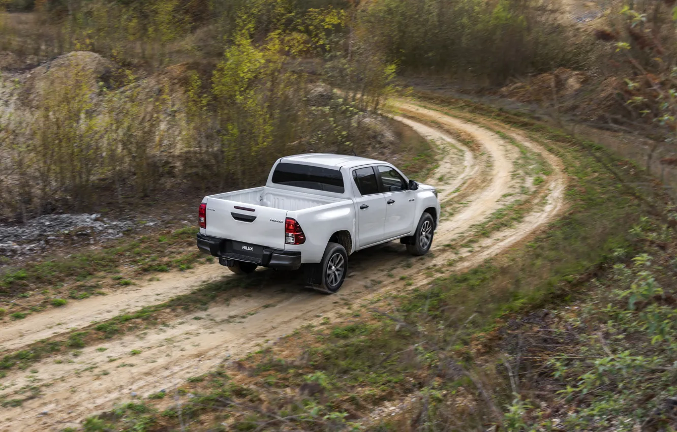 Photo wallpaper road, white, vegetation, turn, Toyota, pickup, Hilux, Special Edition, 2019