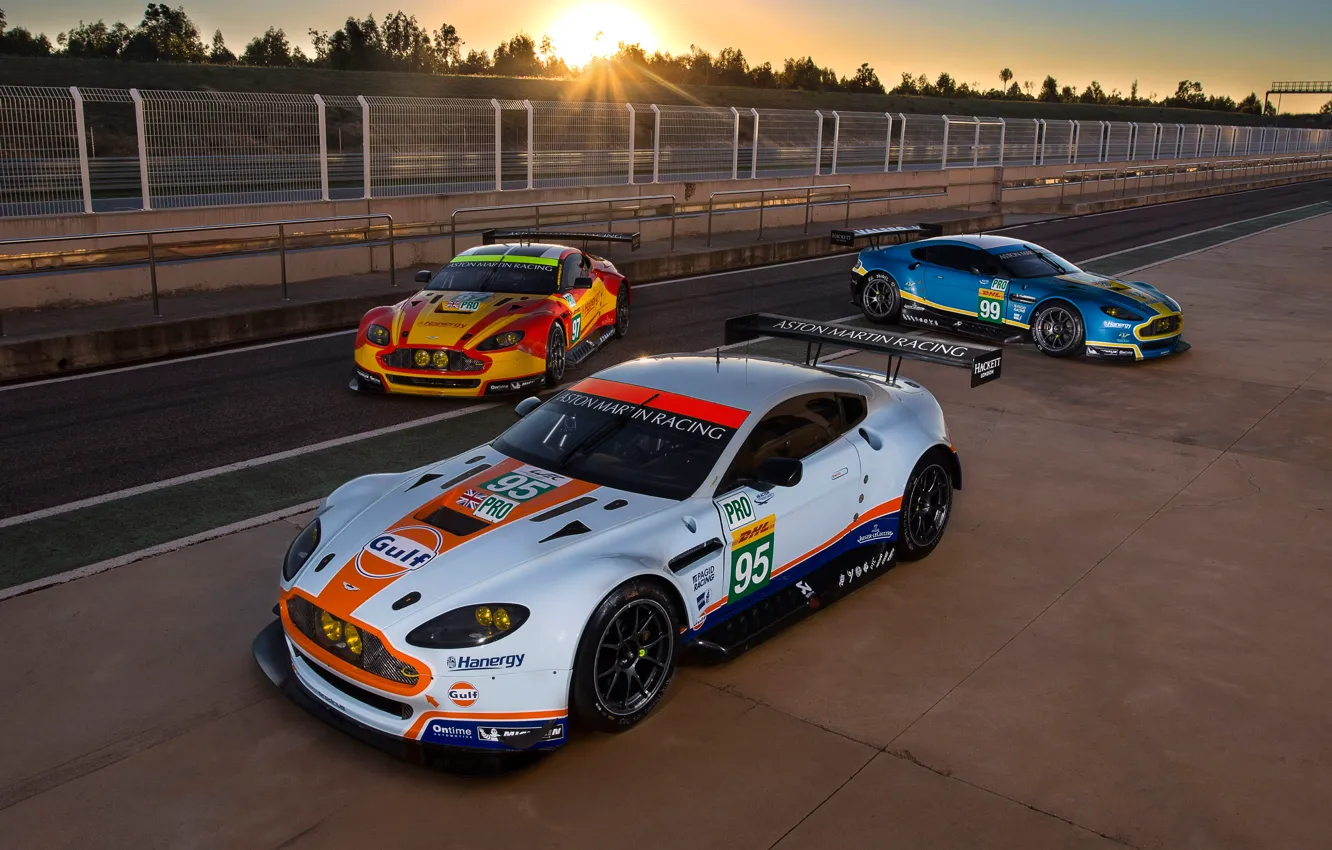 Photo wallpaper Aston Martin, The sun, Wheel, Machine, Lights, Sport, Spoiler, The fence, Racing Car, Race Track