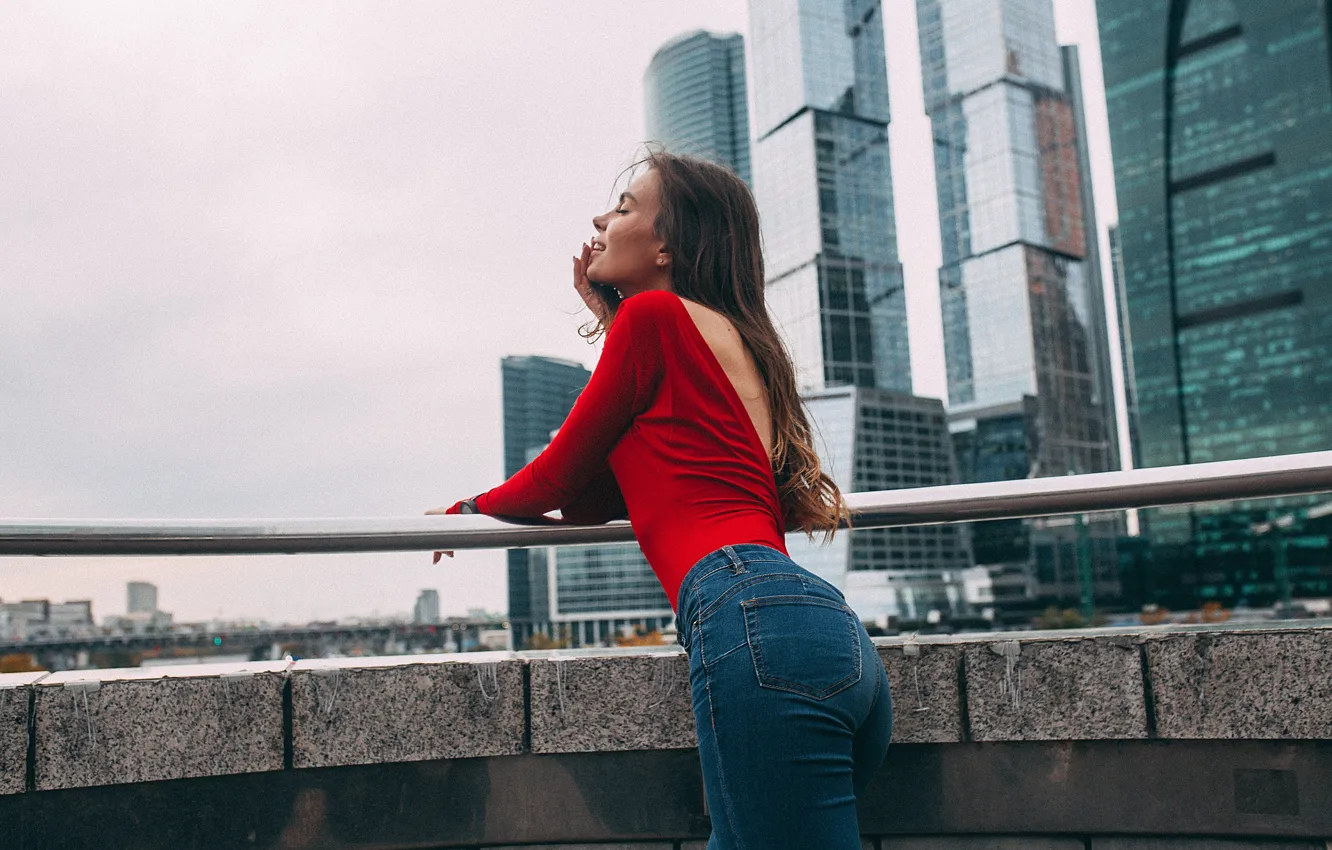 Photo wallpaper ass, the city, pose, hair, building, Girl, jeans, figure, Moscow, business centre, Rome Rome, Natalia …