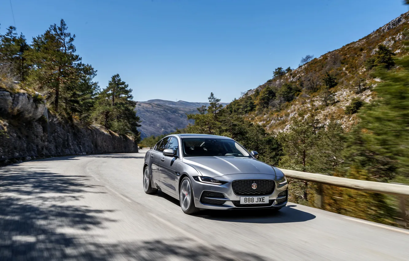 Photo wallpaper road, mountains, Jaguar, sedan, four-door, 2020, gray-silver, Jaguar XE