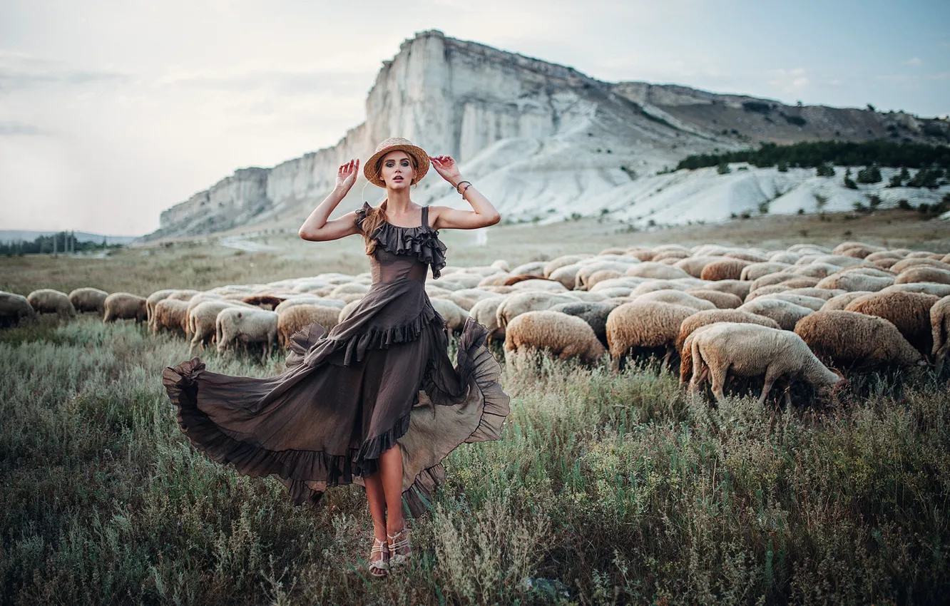 Photo wallpaper girl, pose, rocks, sheep, dress, pasture, hat, Eugene Freyer, a flock of sheep